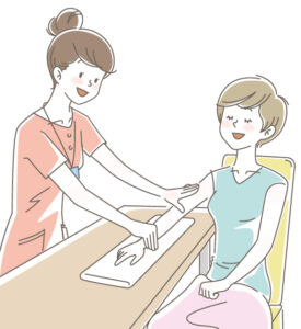 ハンドマッサージの施術を受ける女性のイラスト